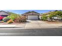 Charming single-story home with a two-car garage, desert landscaping, and a cozy curb appeal at 22531 W Yavapai St, Buckeye, AZ 85326