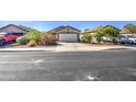 Charming single-story home with a two-car garage, desert landscaping, and a cozy curb appeal at 22531 W Yavapai St, Buckeye, AZ 85326