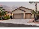 Charming single-story home featuring a spacious three-car garage, desert landscaping, and neutral color palette at 3887 E Andre Ave, Gilbert, AZ 85298