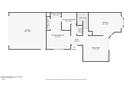 First floor plan featuring a living room, kitchen, and garage at 7559 W Turquoise Ave, Peoria, AZ 85345