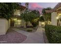 Inviting condo community with landscaped walkways and charming exterior details, perfect for relaxed living at 1017 E Maryland Ave # 110, Phoenix, AZ 85014