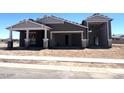 New construction home featuring neutral tones and a spacious three-car garage, awaiting your personal touches at 22961 E Twin Acres Dr, Queen Creek, AZ 85142