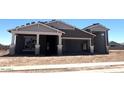 New construction home featuring neutral tones and a spacious three-car garage, awaiting your personal touches at 22961 E Twin Acres Dr, Queen Creek, AZ 85142