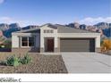 New construction home with a gray color palette, low-maintenance desert landscaping, and a mountain backdrop at 28200 N Nealite Dr, San Tan Valley, AZ 85143