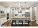 Elegant kitchen features granite countertops, ample cabinet space, and a stylish island at 4088 E Comstock Dr, Gilbert, AZ 85296