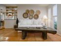Bright living room featuring stylish decor, a unique coffee table, and decorative wall art at 8720 E Via De Dorado --, Scottsdale, AZ 85258