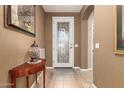 Welcoming foyer with decorative tiled floors and elegant front door at 1805 E Atole Pl, Queen Creek, AZ 85140