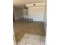 Bright living room with tile flooring, a ceiling fan, and sliding glass doors at 4927 W Golden Ln, Glendale, AZ 85302