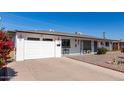 Lovely single-story home with a garage, well-kept landscaping, and inviting curb appeal at 5526 E Cicero St, Mesa, AZ 85205