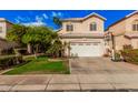 Charming two-story home with a two-car garage, desert landscaping, and a basketball hoop at 7520 S Jentilly Ln, Tempe, AZ 85283