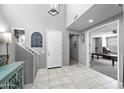 Open entryway featuring high ceilings, tile flooring, and stylish decor at 868 W Desert Glen Dr, San Tan Valley, AZ 85143