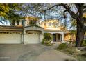 Spacious home with a three car garage, mature trees, and a tile roof at 22339 N 77Th Way, Scottsdale, AZ 85255