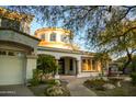 Stunning home with a tile roof, three car garage, and desert landscaping at 22339 N 77Th Way, Scottsdale, AZ 85255