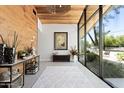 Bright foyer with wood accents, natural light, and modern decor at 6301 E Exeter Blvd, Scottsdale, AZ 85251