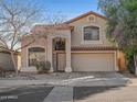 Charming two-story house with a well-maintained yard and neutral color scheme at 8613 S 49Th Dr, Laveen, AZ 85339