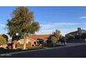 Charming single-story home featuring a well-manicured lawn and a two-car garage at 2237 N Kachina --, Mesa, AZ 85203