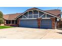 Attached two-car garage with brick detailing and a well-maintained exterior, offering convenience at 2237 N Kachina --, Mesa, AZ 85203