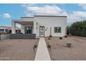 Charming home featuring a cozy front porch, modern landscaping, and freshly painted exterior at 2246 E Sheridan St, Phoenix, AZ 85006