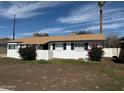 Nice exterior view of a single-story home with well-maintained front yard landscaping at 5000 W Osborn Rd, Phoenix, AZ 85031