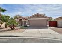 Charming single-Gathering home with a tile roof, low-maintenance landscaping, and an attached two-car garage at 7259 W Tina Ln, Glendale, AZ 85310