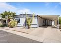 Pleasant home exterior featuring lovely desert landscaping and covered parking at 8103 E Southern Ave # 25, Mesa, AZ 85209