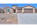 Inviting single-story home with a well-maintained front yard featuring desert landscaping at 4576 W Agave W Ave, Eloy, AZ 85131