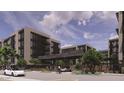 Exterior view of modern apartment buildings with covered parking and landscaping at 19355 N 73Rd Way # 4016, Scottsdale, AZ 85255