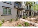Charming townhome featuring a private balcony, desert landscaping, and well-maintained exterior at 2090 S Dorsey Ln # 1020, Tempe, AZ 85282