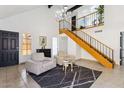 Inviting living room with high ceilings, and tile flooring, creating a bright and airy atmosphere at 2138 W Beaubien Dr, Phoenix, AZ 85027