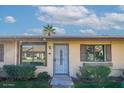 Welcoming single-story home with a security door and neat front lawn under a sunny sky at 2440 N 22Nd Ave, Phoenix, AZ 85009