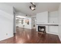 Bright living room features a fireplace, wood floors and an open floorplan at 2875 W Highland St # 1102, Chandler, AZ 85224