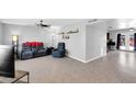Spacious living room with plenty of seating, natural light, and modern decor at 5905 N 83Rd St, Scottsdale, AZ 85250