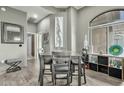 Elegant dining room featuring modern table set, stylish decor, and ample natural light at 11640 N Tatum Blvd # 3048, Phoenix, AZ 85028