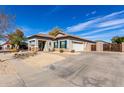 Charming single Gathering home with tile roof, stone accents, and low maintenance desert landscaping at 3426 E Elgin St, Gilbert, AZ 85295