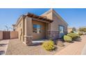 Attractive exterior of the house, with brick accents, well-kept landscaping, and a covered entry at 6202 E Mckellips Rd # 171, Mesa, AZ 85215