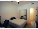 Comfortable bedroom with a mirrored closet and a calming atmosphere perfect for relaxation and rest at 3150 E Beardsley Rd # 1105, Phoenix, AZ 85050