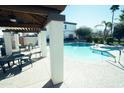 Inviting community pool area with ample seating, perfect for relaxing and enjoying sunny days at 3150 E Beardsley Rd # 1105, Phoenix, AZ 85050