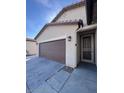 Spacious two car garage with an easy entry access door at 4250 N 87Th Ln, Phoenix, AZ 85037