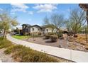 Beautiful single-story home with desert landscaping in a well maintained community at 4683 N 206Th Ln, Buckeye, AZ 85396