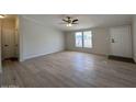 Bright and airy living room with neutral walls and modern hardwood flooring at 538 S 98Th St, Mesa, AZ 85208