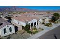 Panoramic aerial shot of a neighborhood showcasing modern homes with desert landscaping at 12330 E Crystal Frst, Gold Canyon, AZ 85118