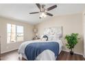 Serene bedroom with a plush bed, stylish decor, and natural light at 320 E Mckellips Rd # 166, Mesa, AZ 85201