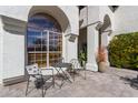 A covered patio showcases an outdoor seating area, perfect for entertaining at 6576 W Lone Cactus Dr, Glendale, AZ 85308