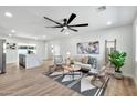 Bright and airy living area with modern decor, natural light, and a comfortable seating arrangement at 455 E Garfield St, Tempe, AZ 85288