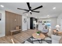 Spacious open-plan living room with modern furnishings, stylish decor, and wood flooring at 455 E Garfield St, Tempe, AZ 85288
