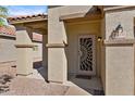 Welcoming front porch with decorative security door and neutral color scheme at 2910 W Allens Peak Dr, San Tan Valley, AZ 85144