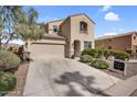 Charming two-story home featuring a two-car garage, neutral stucco exterior, and low maintenance desert landscaping at 1236 E Mescal St, Phoenix, AZ 85020