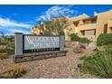 Woodland Springs Condominiums community sign surrounded by lovely landscaping at 8055 E Thomas Rd # A102, Scottsdale, AZ 85251