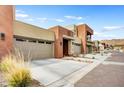 Contemporary home exteriors with desert landscaping; modern design at 11673 N 136Th St # 1019, Scottsdale, AZ 85259