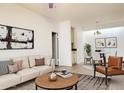 Bright and airy living room with modern decor and comfortable seating arrangement, ideal for relaxation and entertaining at 2035 S Elm St # 114, Tempe, AZ 85282